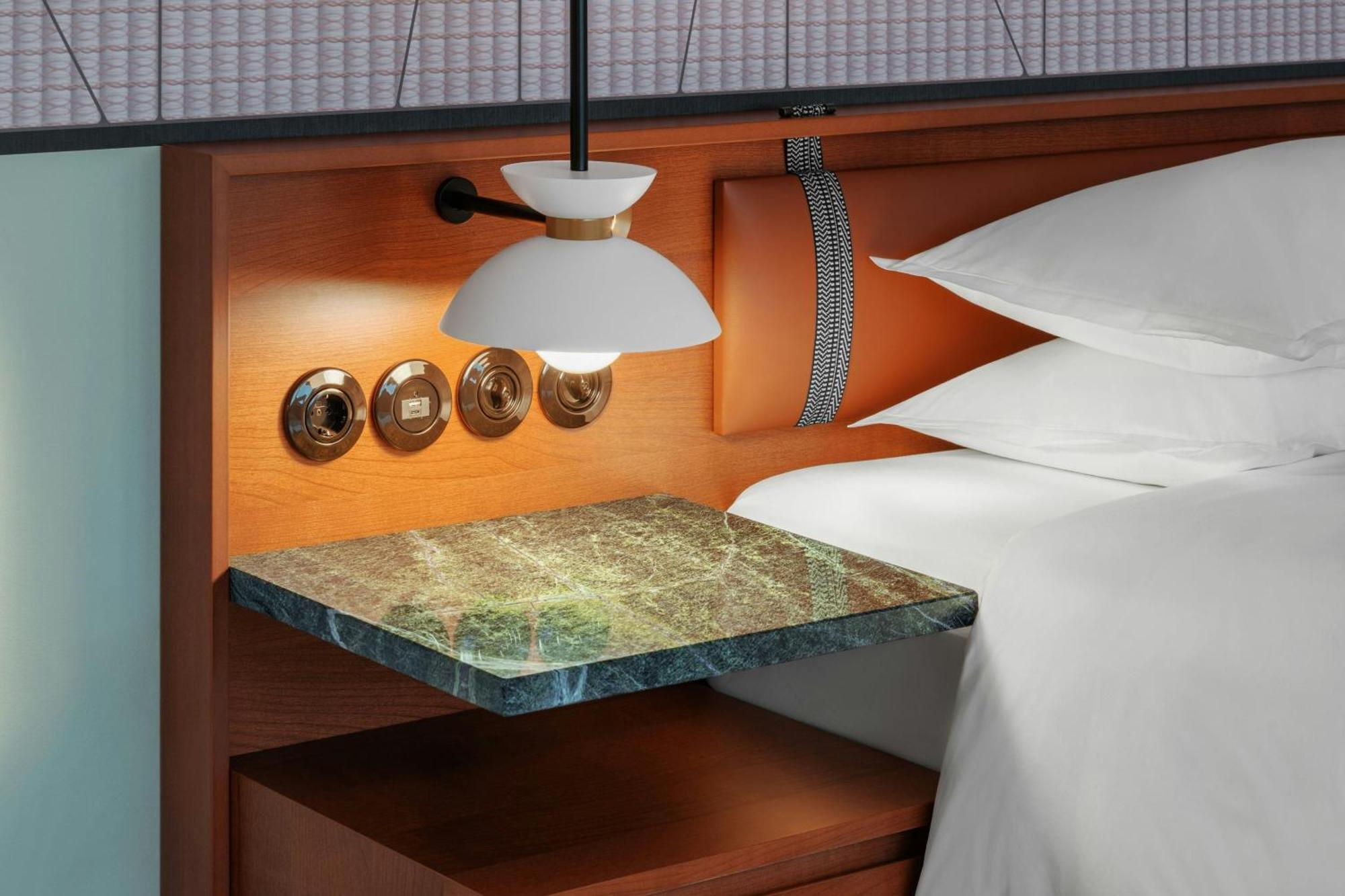Sheraton Stockholm Hotel Exterior photo A bedside table made of glass